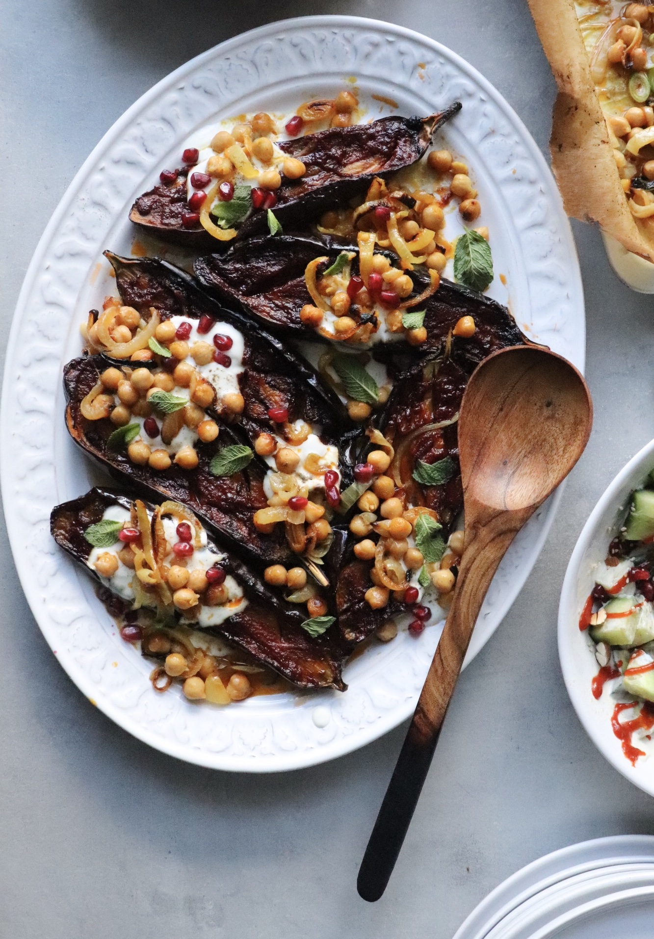 Roasted aubergine with chickpeas and pomegranate