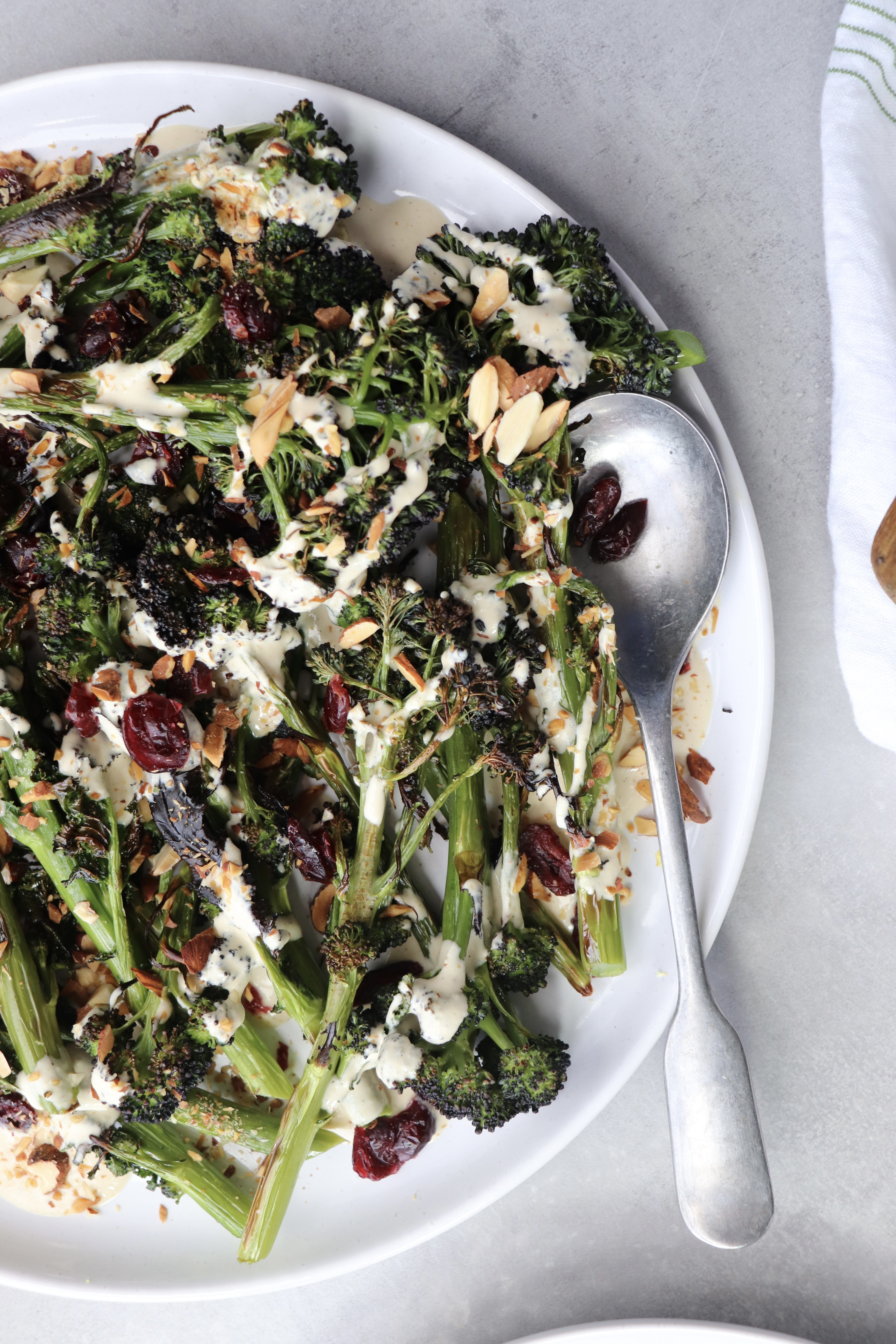 Charred broccolini with tahini and cranberries